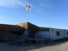 04D Canada And Nunavut Flags Fly Above The Ulaajuk Elementary School In Pond Inlet Mittimatalik Baffin Island Nunavut Canada For Floe Edge Adventure